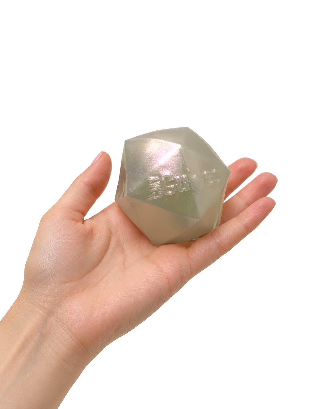 A pearl PolySquish Discovery Series #2 shape resting in the palm of a hand