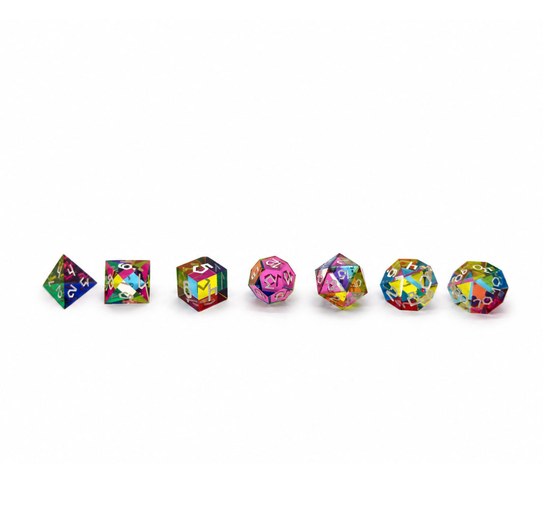 All seven Septem Aleae polyhedral dice lined up in a row, smallest to largest