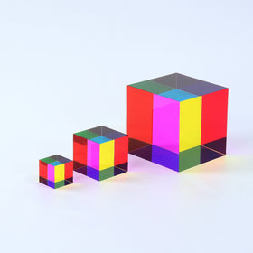 The Original CMY Cube, a translucent cyan, magenta and yellow cube